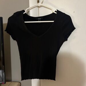 black ruffle tee